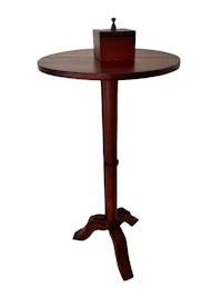 a round table with a box on top
