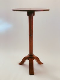 a round table with a wooden base