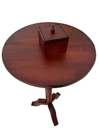 a round table with a box on top